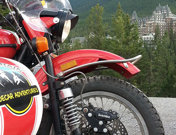 Rocky Mountain Sidecar Adventures bike with the Banff Springs in the background